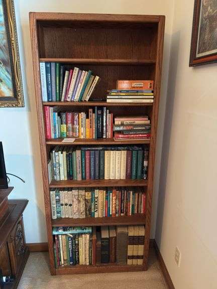 Bookshelf and Contents (Assorted Paperback and Hardbound Books) 72” T x 30” W image