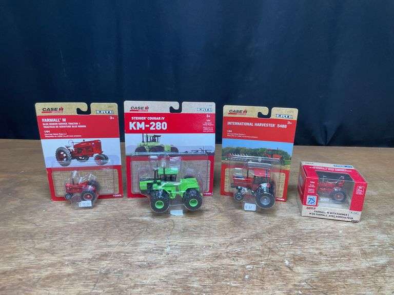 (4) 1/64 IH + Steiger Tractors NIB Ertl image