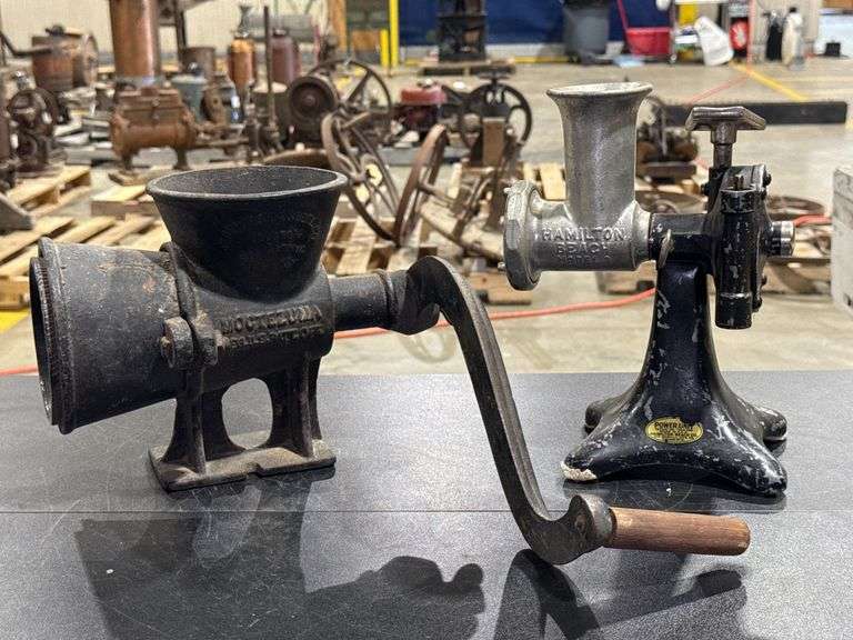 Two hand-cranked meat grinders image