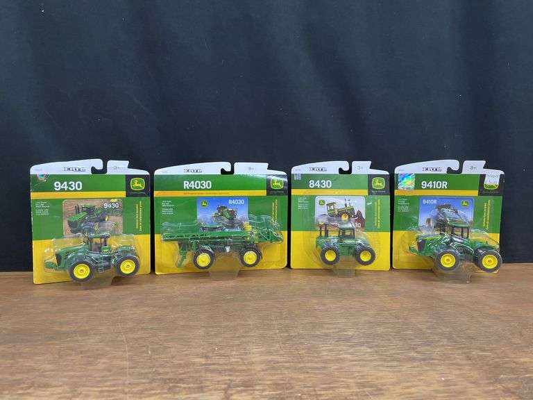 (4) 1/64 John Deere NIB Ertl image