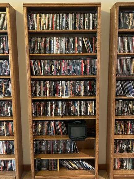 Bookshelf and DVDs, Sony TV DVDs, alphabetically organized M through V. The shelf is 82” tall by 36” wide. image