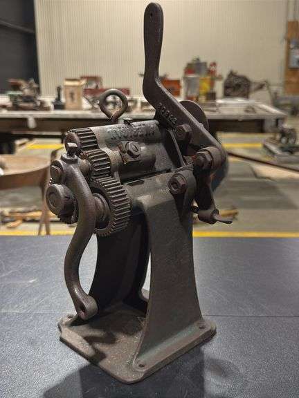 American leather splitter, also known as a leather skiver or cutter image