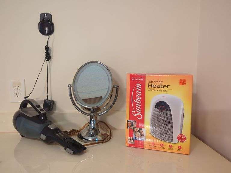 Sunbeam Heater, Black and Decker Dustbuster and Conair Lighted Mirror image