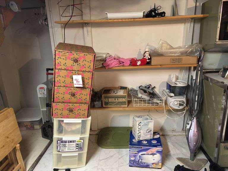 Wall of household supplies & Cabinets with lightbulbs