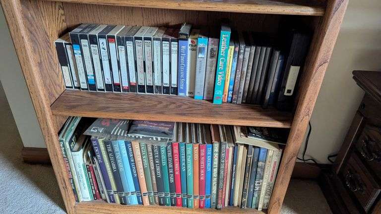 Bookshelf and Contents (Assorted VHS Movies) 72” T x 30” W