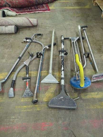 Lot of extracting tools, carpet wands and extractors image