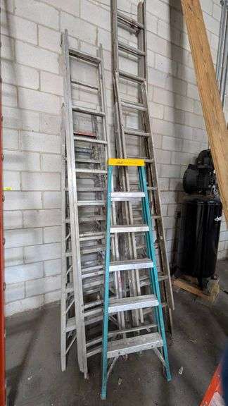 Assorted aluminum extension ladders Louisville 6-ft ladder lot image