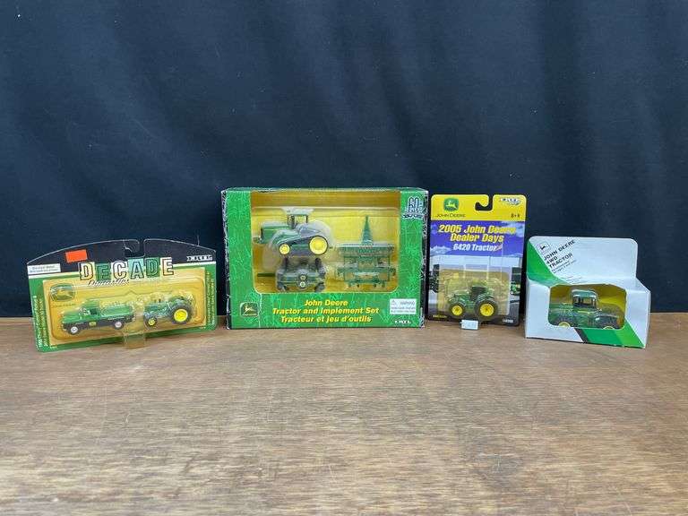 (4) 1/64 John Deere NIB Ertl image