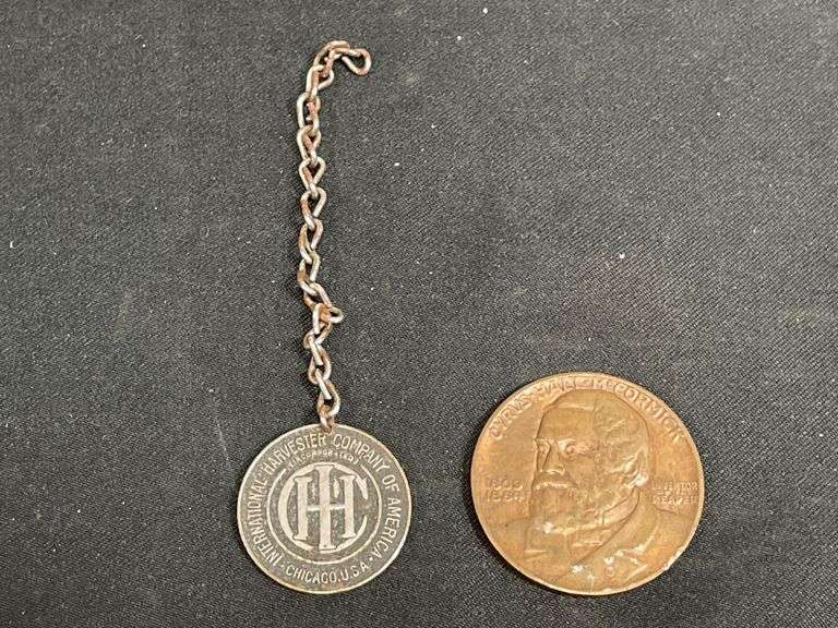 (2) IH Charm + McCormick Centennial of the Reaper Coin image