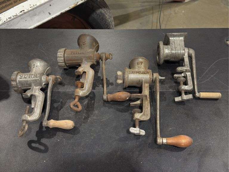 Collection of Four Hand-Cranked Meat Grinders, also known as food choppers or mincers image