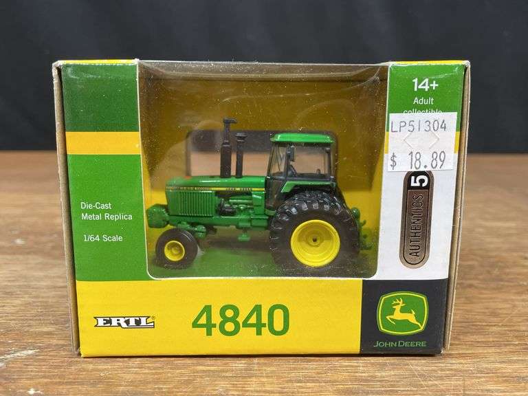 1/64 John Deere 4840 Authentics NIB Ertl image
