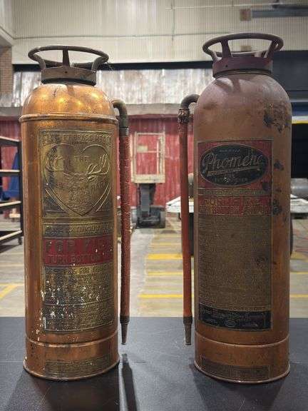 Two Copper Fire Extinguishers image