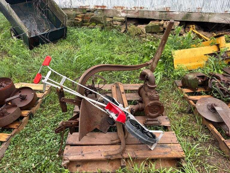 Walking Plow, Hand Pump, and Walking Planter image
