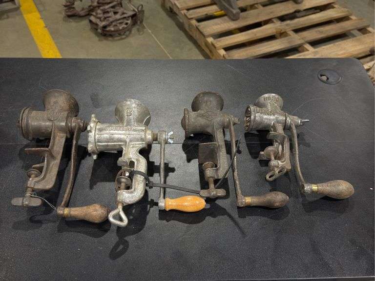 Collection of Four Hand-Cranked Meat Grinders, also known as food choppers or mincers image