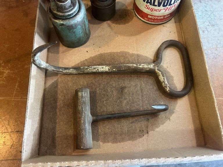 Old Oil Cans and Hand Hooks