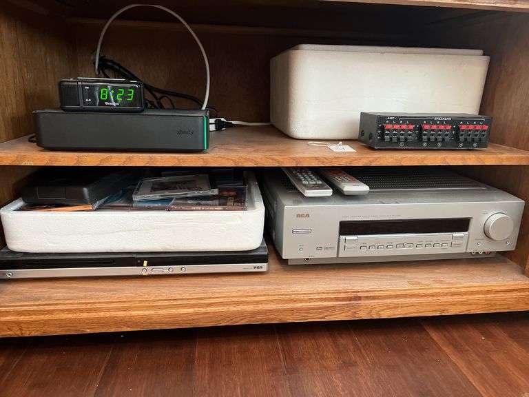 DVD Player, Stereo Console, and Assorted CDs image