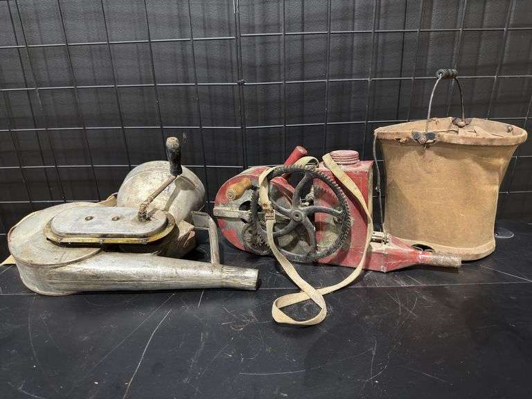 Two agricultural dusters “Little Giant Duster” and a Canvas water pail image
