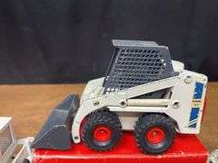 (3) 1/19 Bobcat Skid Steer Loaders