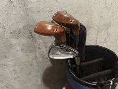 Golf Bag along with clubs and head covers