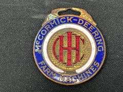 (2) IHC McCormick-Deering Watch Fob + Printers Block