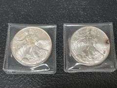 (2) 2003 & 2005 $1 American Silver Eagle