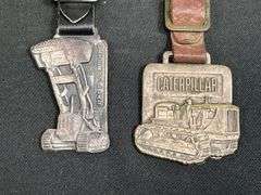 (2) Caterpillar Watch Fobs