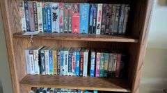 Bookshelf and Contents (Assorted VHS Movies) 72” T x 30” W