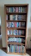 Bookshelf and Contents (Assorted VHS Movies) 72” T x 30” W