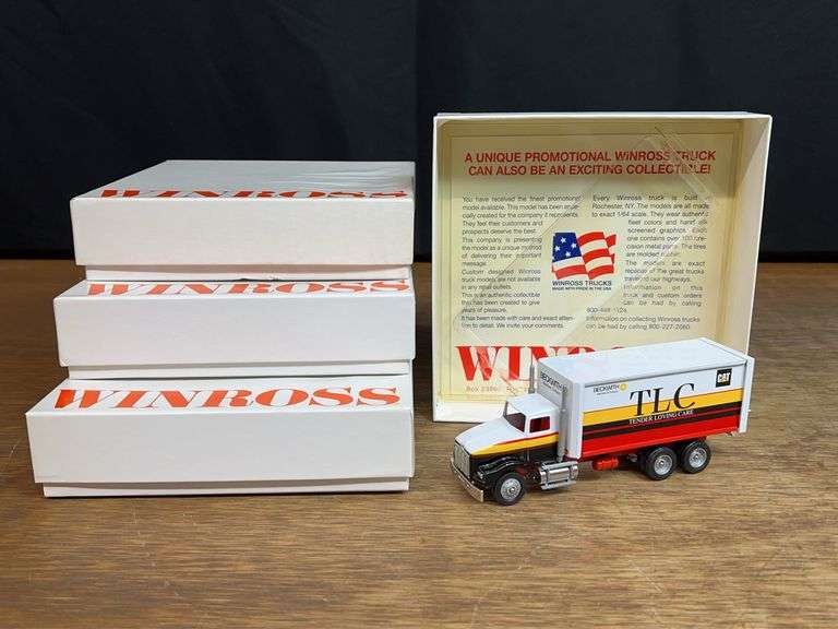 (3) 1/64 Caterpillar Trucks NIB Winross image