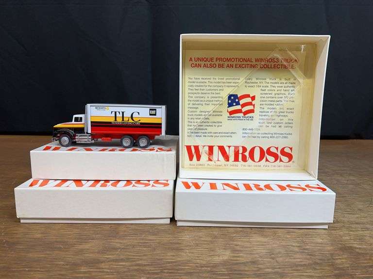(2) 1/64 Caterpillar Trucks NIB Winross image