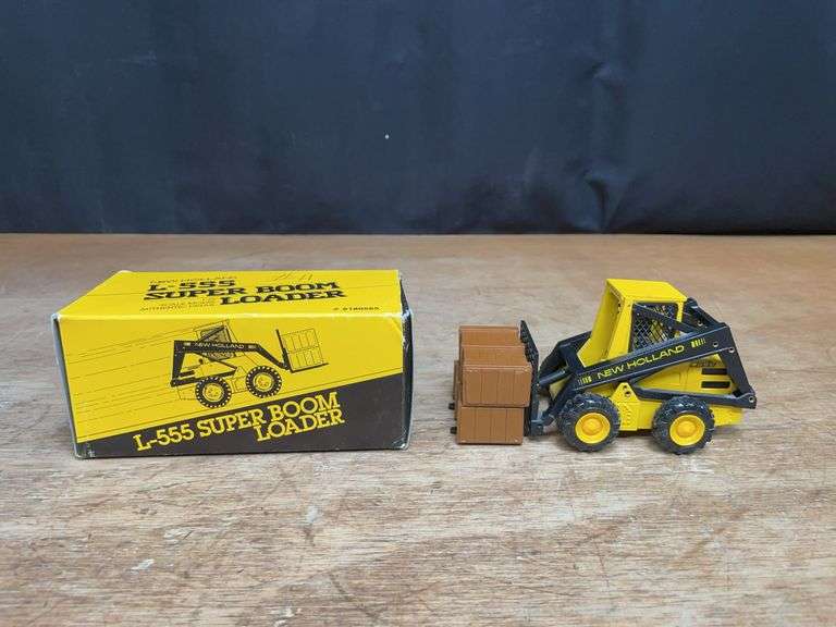 1/25 New Holland L-555 Skid Loader NIB NZG image