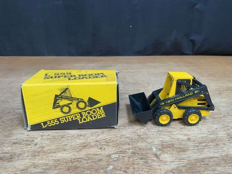 1/25 New Holland L-555 Skid Loader NIB NZG image