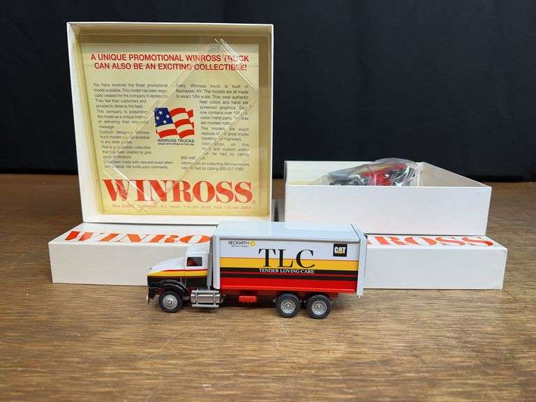 (2) 1/64 Caterpillar Trucks NIB Winross image