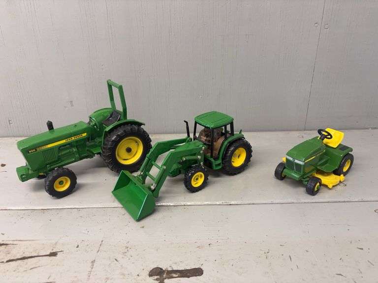 1/16 John Deere 950, 1/32 John Deere 6210, and 1/16 John Deere Lawnmower Ertl image