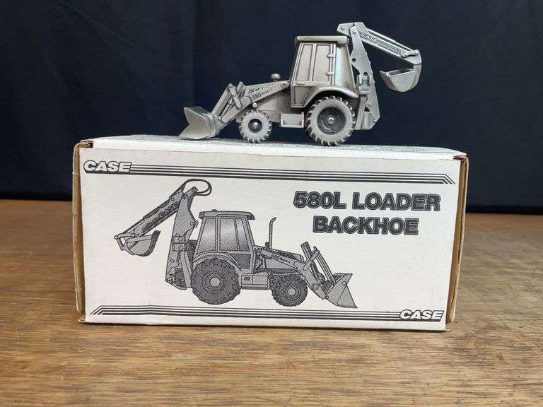 1/43 Case 580L Backhoe Pewter NIB SC image