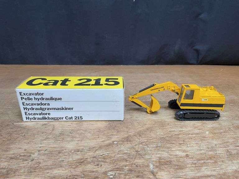 1/50 Caterpillar 215 Excavator NIB NZG image