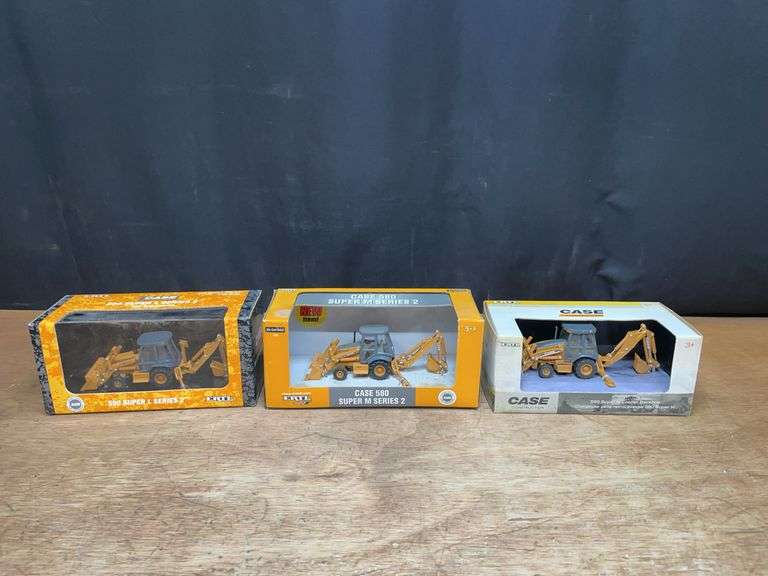 (3) 1/50 Case Backhoes NIB Ertl image