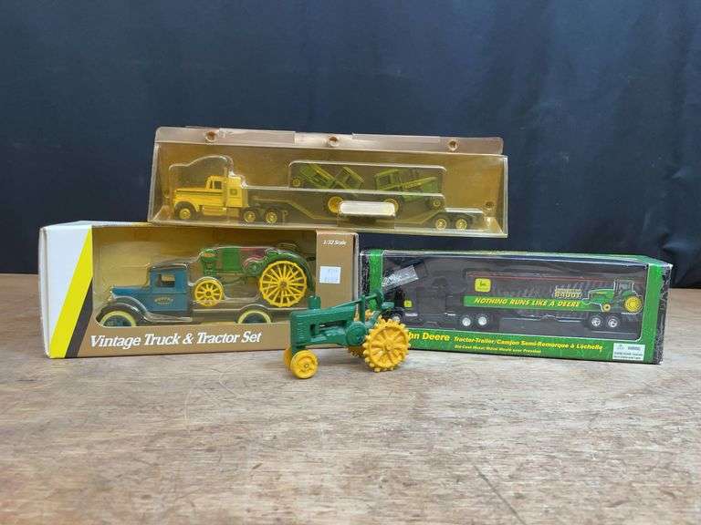 (4) John Deere Trucks + Tractor image