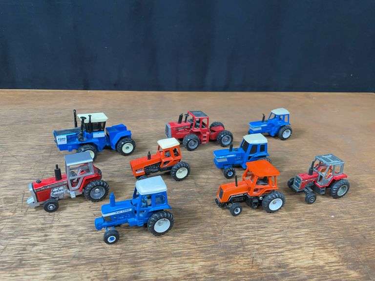(9) 1/64 Ford, MF, AC Tractors Ertl image