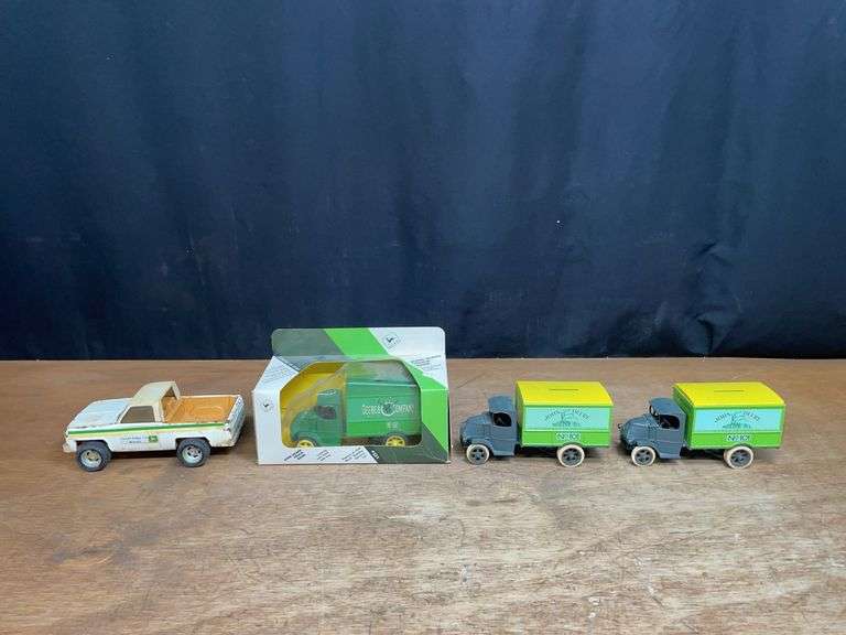 (4) John Deere Trucks image