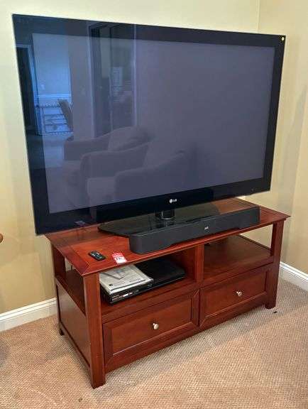 LG 60" Flatscreen TV, Polk Soundbar & Quality Console image