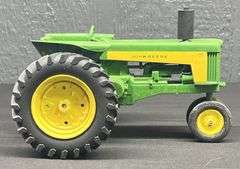 ERTL John Deere 730 Diesel Tractor