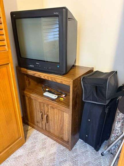 Cot, Luggage & RCA TV/Entertainment Center