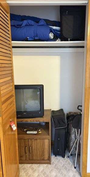 Cot, Luggage & RCA TV/Entertainment Center