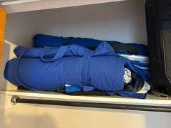 Cot, Luggage & RCA TV/Entertainment Center