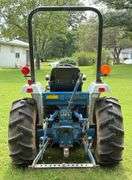 1987-1998 Ford 1320 Tractor with Mid-Mount Ford 914 Mower