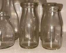 Early Glass Milk Bottles