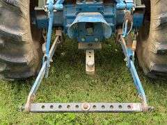 1987-1998 Ford 1320 Tractor with Mid-Mount Ford 914 Mower