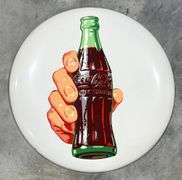 Coca-Cola "Bottle in Hand" Metal Button Sign
