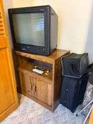 Cot, Luggage & RCA TV/Entertainment Center